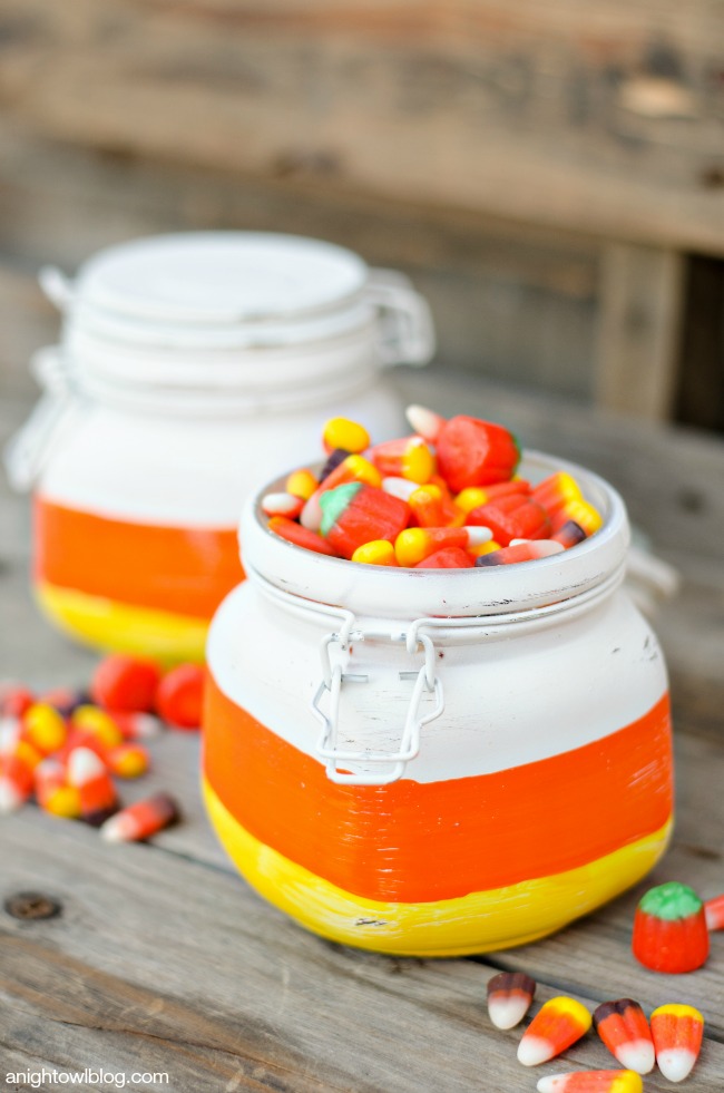 Paint Mason Jars in Candy Corn colors and fill them with treats for a festive fall gift idea! This is a fun kids craft too! 