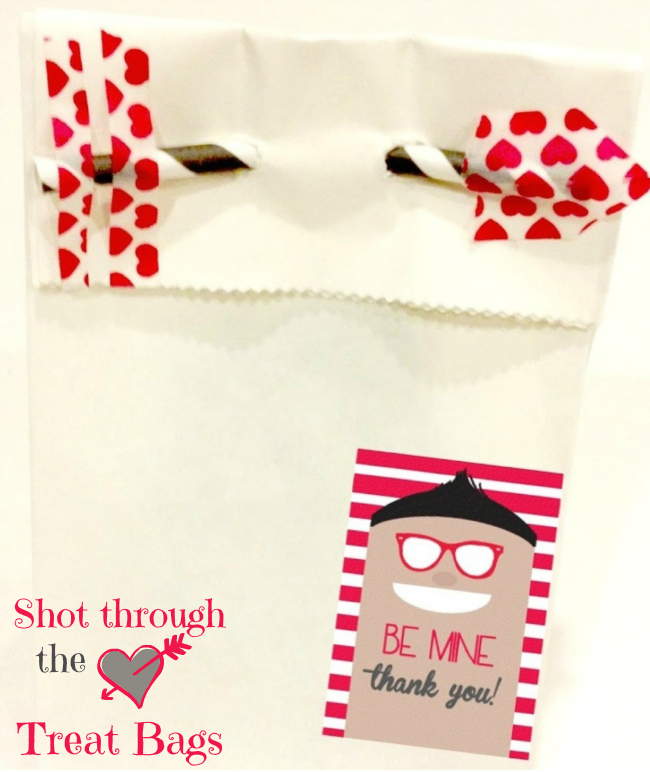 Craft a cute arrow with washi tape and a straw to make these adorable Shot Through the Heart Treat Bags { anightowlblog.com } #valentines #washi