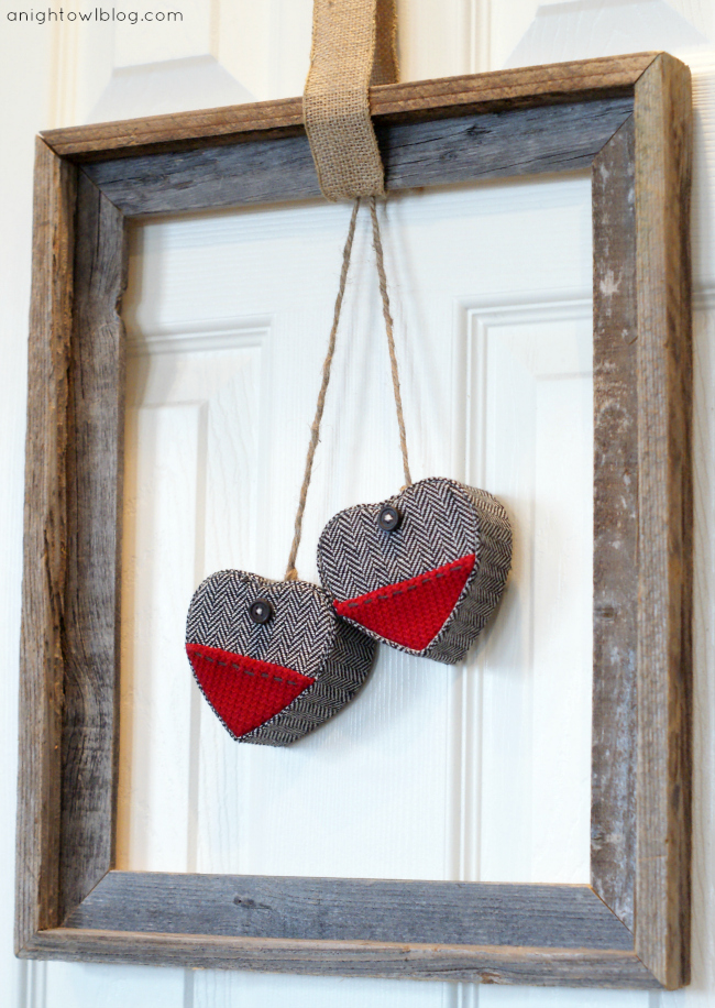 Wow - how easy! All you need is an open frame, twine, burlap and hearts to make this Easy Framed Valentine's Wreath! Learn more at anightowlblog.com