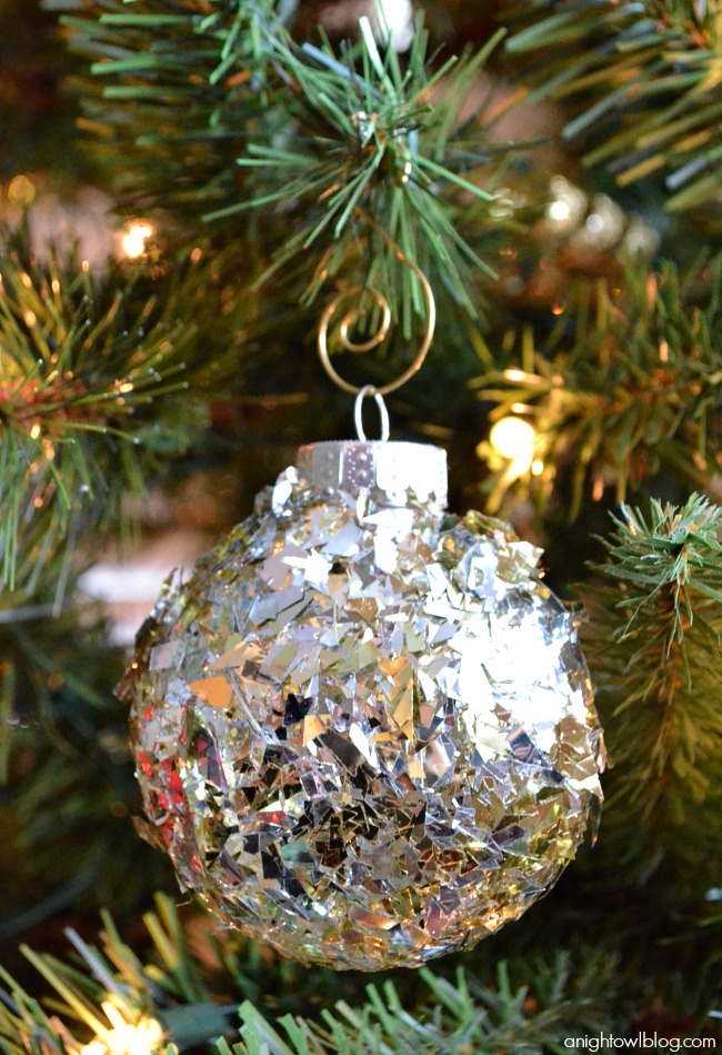 Make your own sparkly and fabulous ornaments with a little confetti and decoupage!