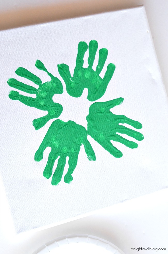 Fun for St. Patrick's Day! Make easy Handprint Clovers or Shamrocks with your little ones!