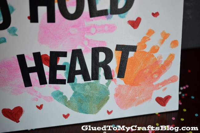 Handprint Mother's Day Kids Canvas - an adorable craft your kids can do in just a few easy steps!