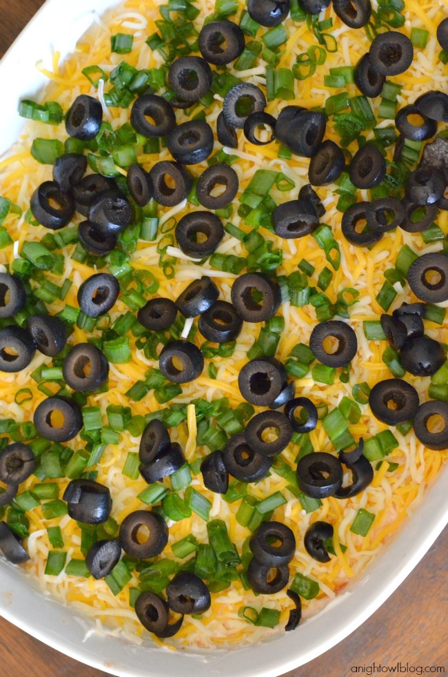 7 Layer Dip - make this delicious dip in just a few easy steps!