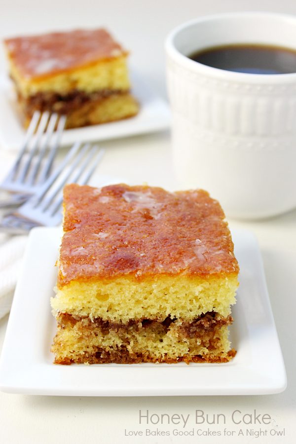 This Honey Bun Cake is reminiscent of the snack cake! A yellow cake mix is doctored up with a few ingredients, including a delicious cinnamon-nut layer!
