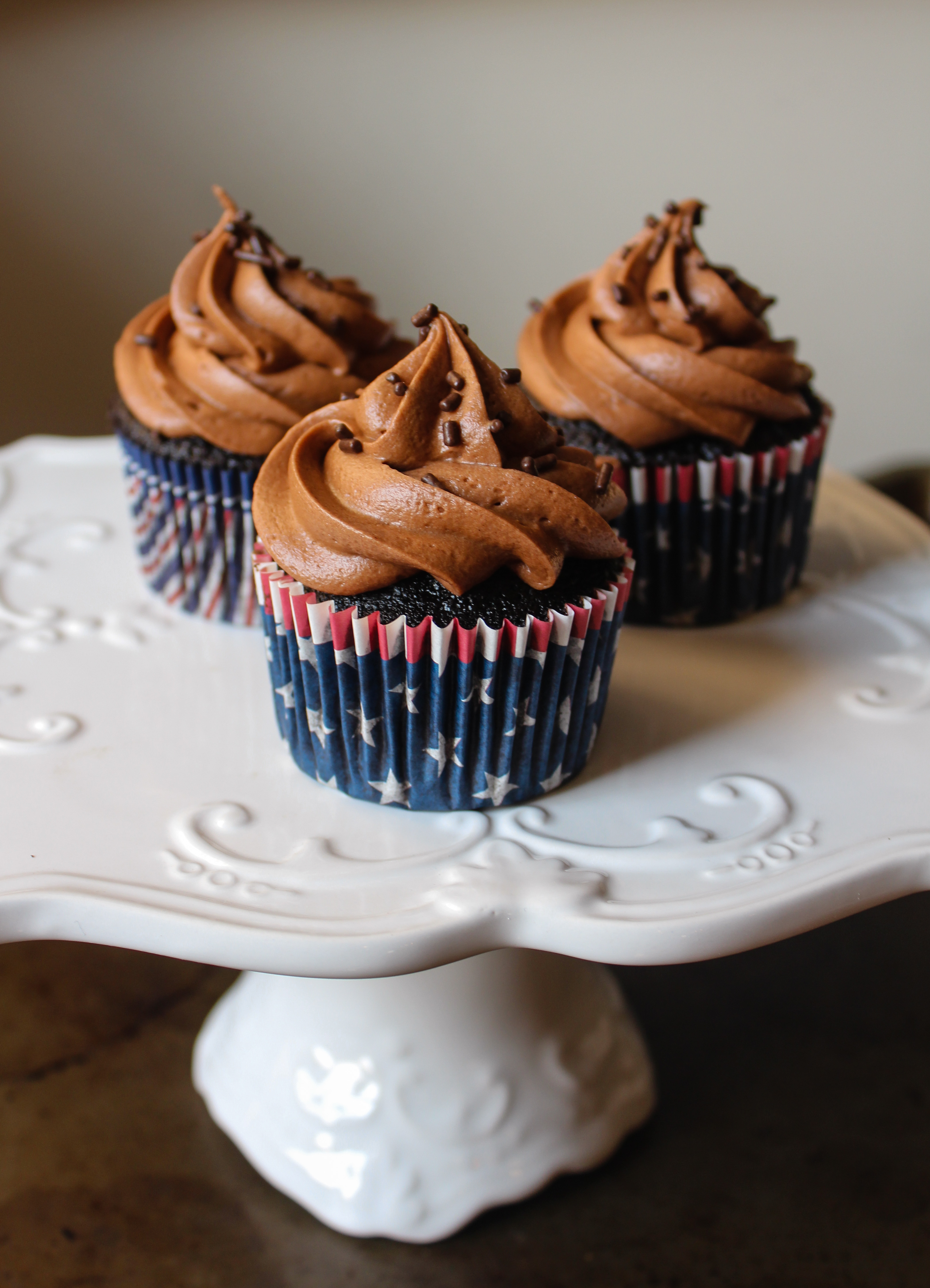 Triple Chocolate Cupcakes - decadent chocolate cupcakes filled with homemade chocolate ganache and topped with the BEST chocolate frosting!