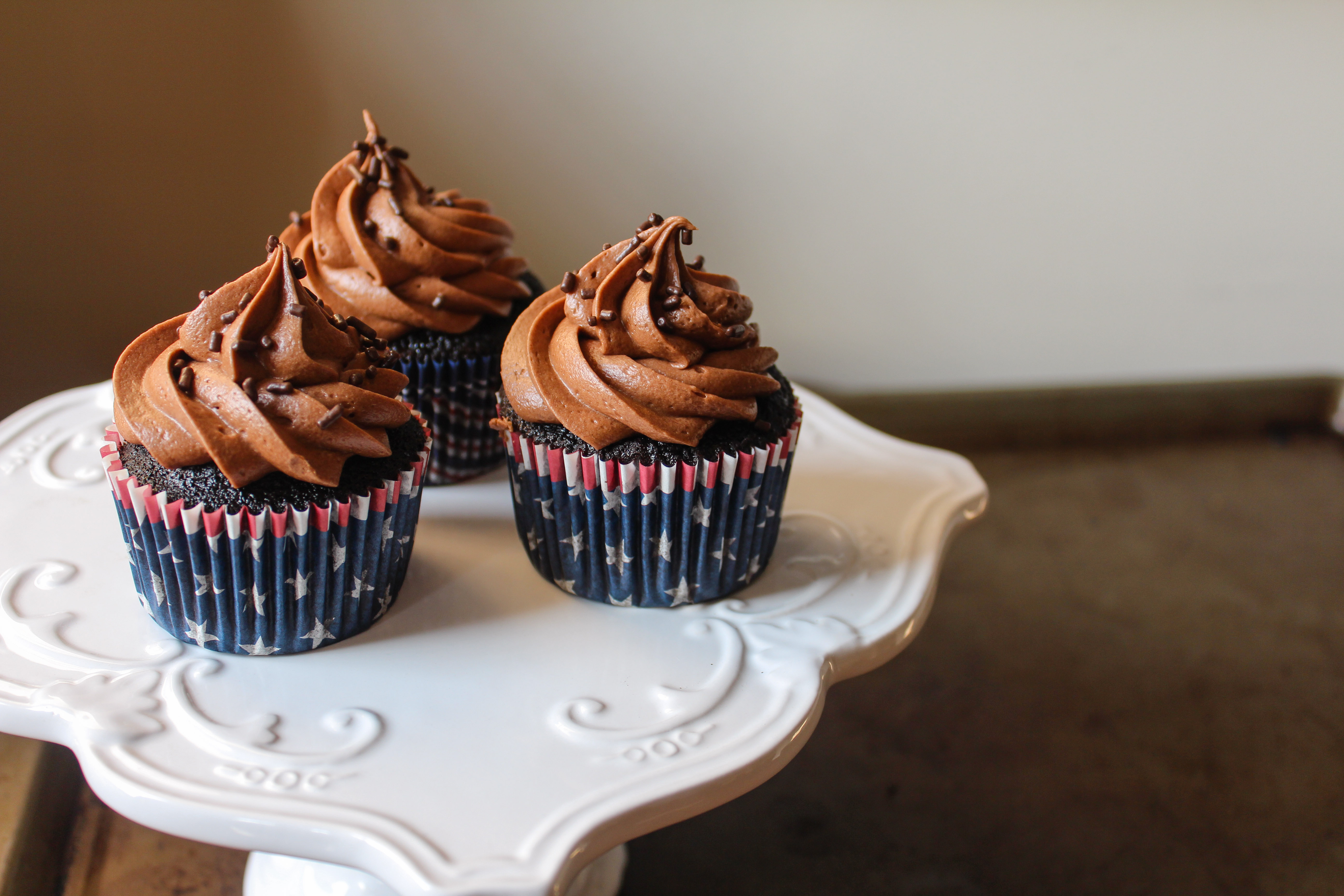 Triple Chocolate Cupcakes - decadent chocolate cupcakes filled with homemade chocolate ganache and topped with the BEST chocolate frosting!