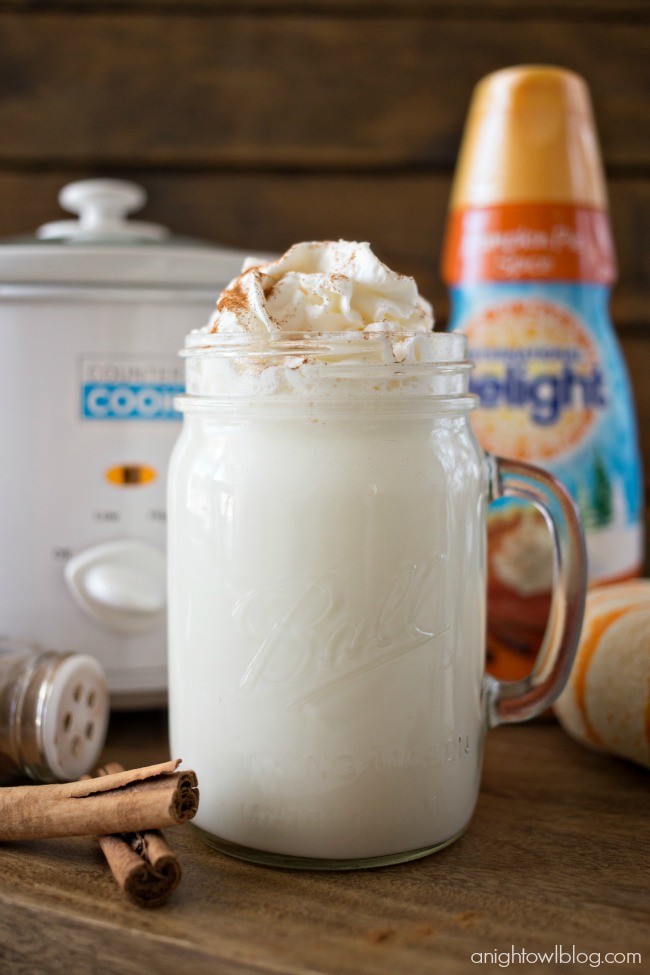 This Crock Pot Pumpkin Spice White Hot Chocolate is just three ingredients and is so easy to make! Perfect for a chilly fall evening!